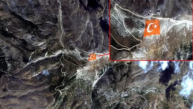 Dağın zirvesine işlenen Türk bayrağı, uydu kamerasına yansıdı